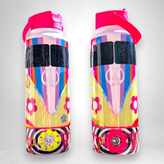 12th Ave Design Co. 40oz stainless steel sport bottle featuring a colorful retro bus design with groovy floral accents