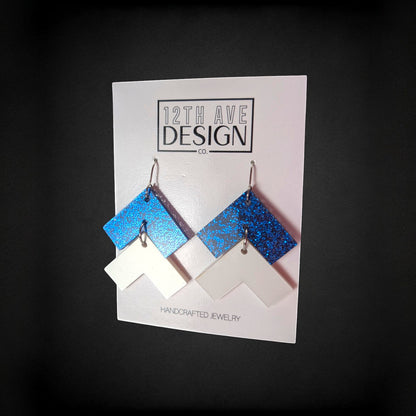 12th Ave Design Co. blue glitter and white chevron drop earrings on surgical steel hooks