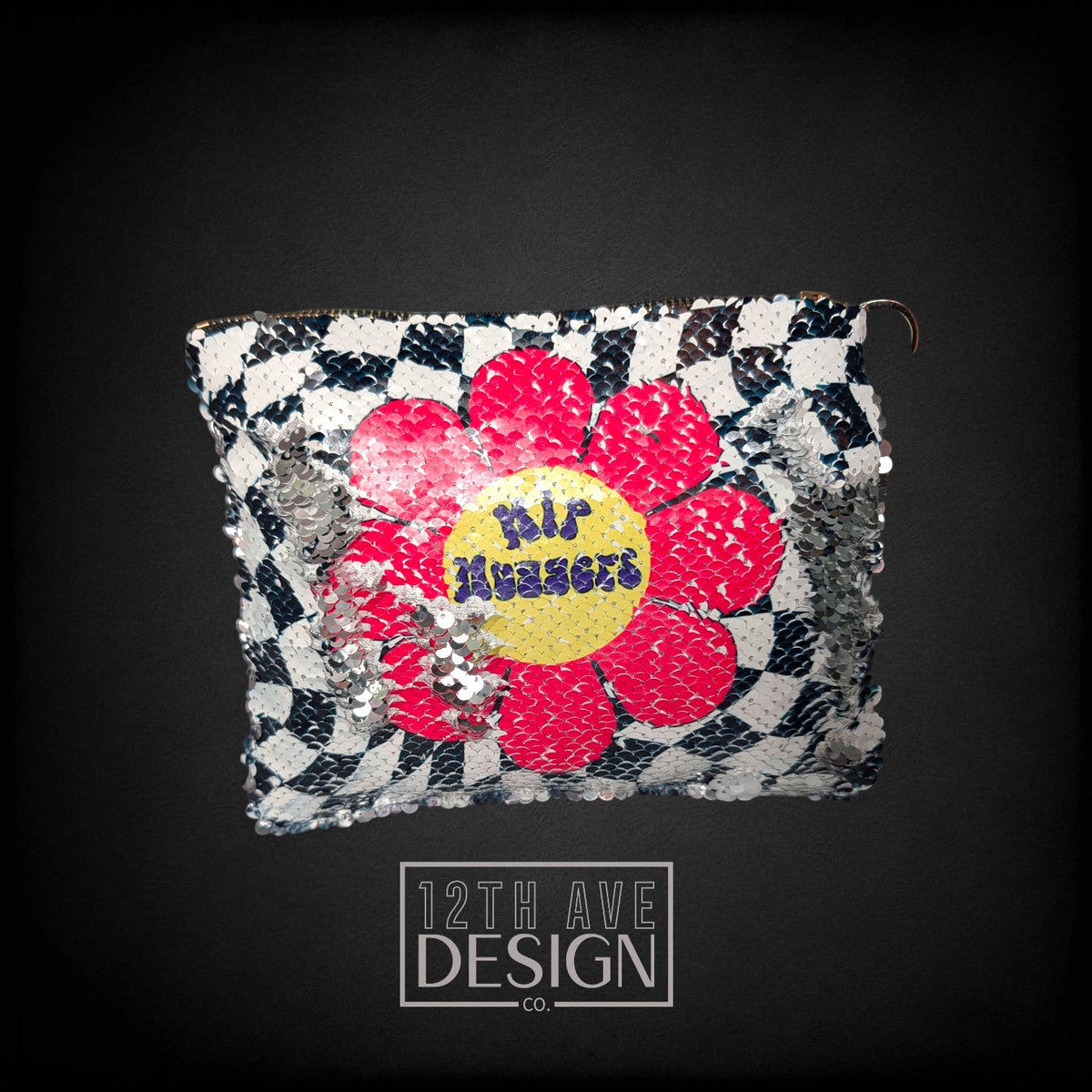 12th Ave Design Co. personalized zippered pouch with black and white checkered sequins and a large pink flower design.