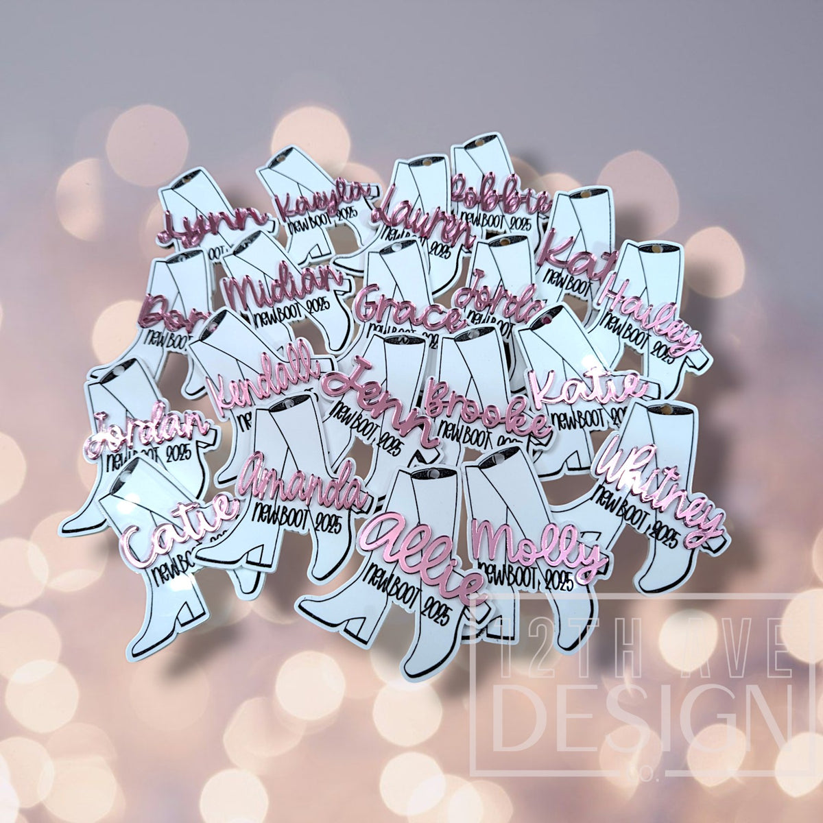 12th Ave Design Co. custom acrylic cowboy boot keychains with personalized pink names for a group event