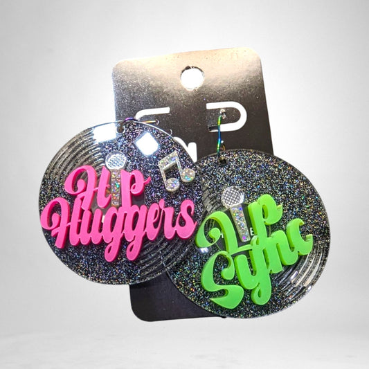 12th Ave Design Co. custom round glittery earrings featuring Hip Huggers and Lip Sync text with microphone accents.
