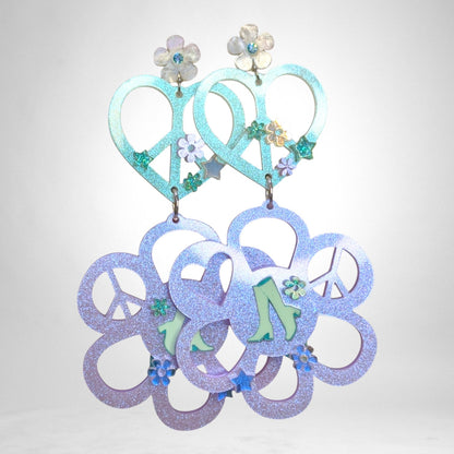 12th Ave Design Co. custom KOHH earrings featuring iridescent glitter heart and flower peace sign charms.