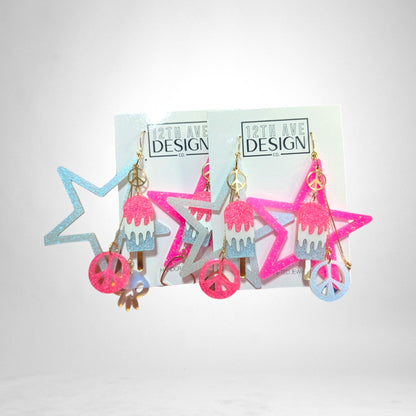 12th Ave Design Co. custom glittery star and popsicle earrings with peace sign charms in pink and blue