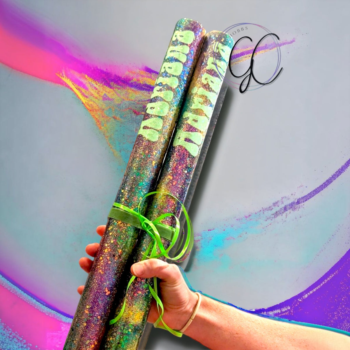 12th Ave Design Co. personalized glittered float peg extenders with green custom lettering and epoxy finish