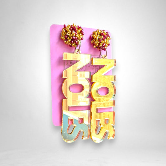12th Ave Design Co. gold mirror acrylic Noles block text earrings with maroon and gold seed bead pom accents.