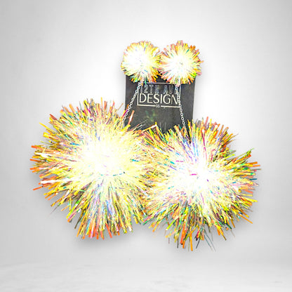 12th Ave Design Co. iridescent tinsel pompom earrings with silver chains and peace sign charms on display card