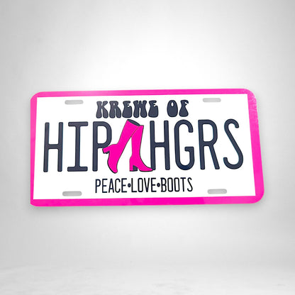 12th Ave Design Co. KOHH aluminum car tag with pink and black typography and boot graphic on a white background