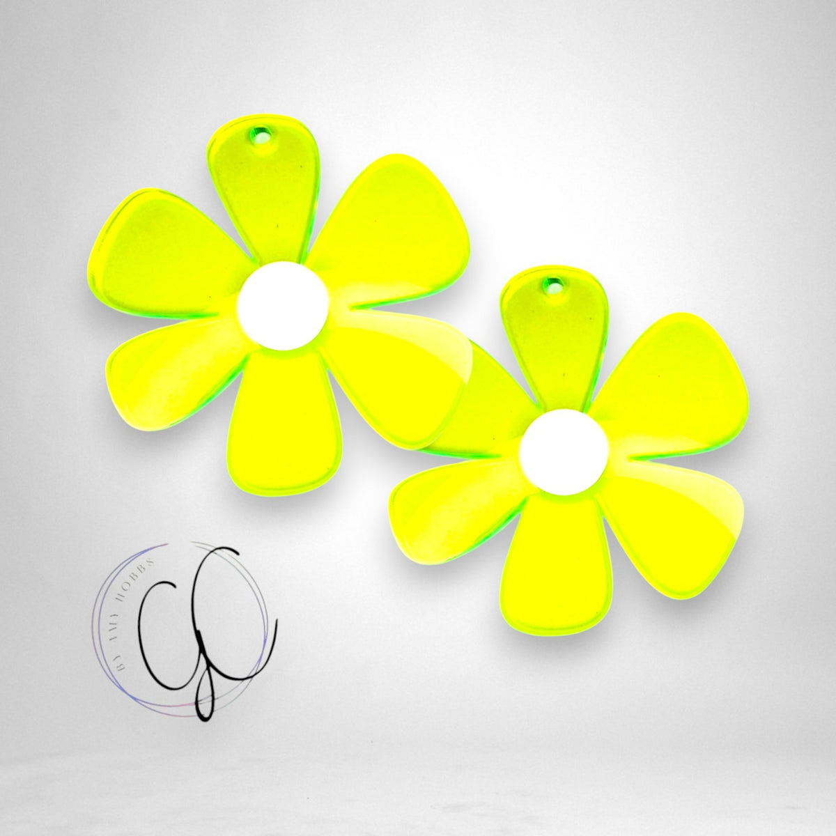 12th Ave Design Co. neon yellow acrylic flower statement earrings with a groovy retro design.