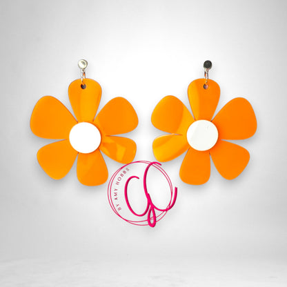 12th Ave Design Co. groovy orange and white flower statement earrings with a bold retro design