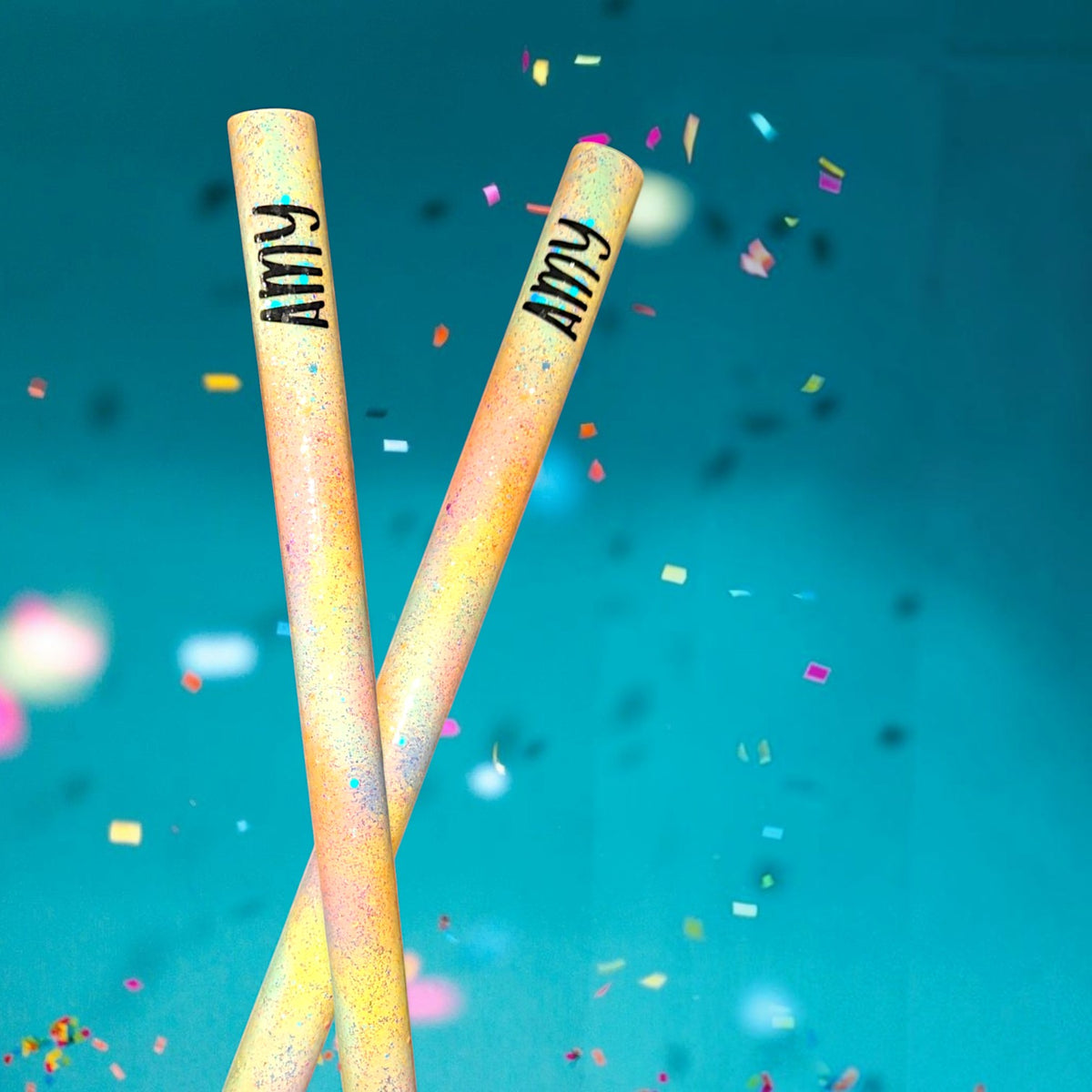 12th Ave Design Co. personalized glittery yellow and pink bead peg extenders for float riders with Amy name detail