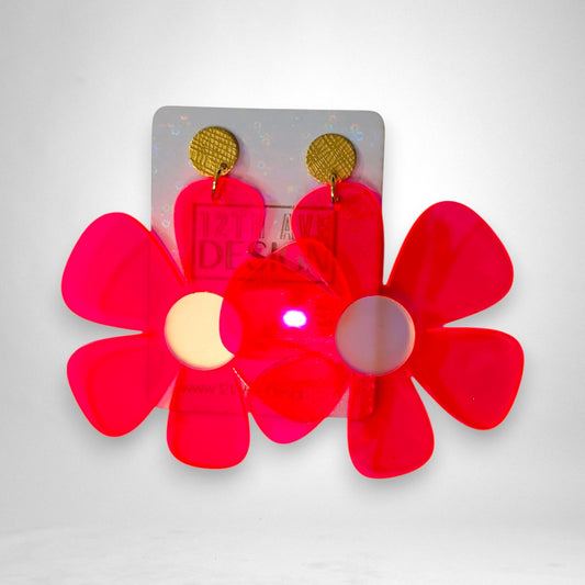 12th Ave Design Co. Flower Power statement earrings in translucent hot pink acrylic with gold textured studs.