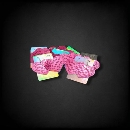 12th Ave Design Co. custom pink heart-shaped disco ball earrings on branded display cards