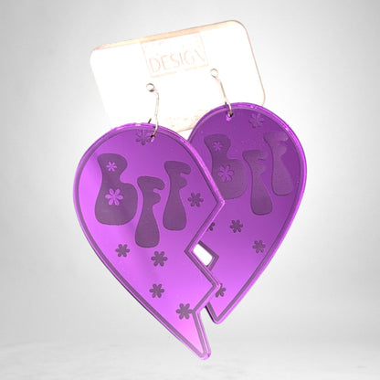 12th Ave Design Co. purple acrylic BFF heart earrings with groovy flower cutouts on a branded display card